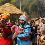 Photo of People in Traditional Wear