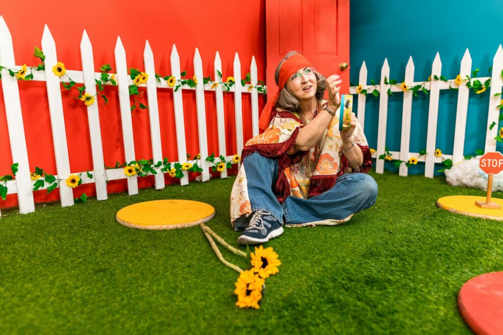 Woman With Orange Headband Holding A Tambourine