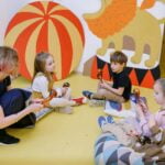 Children Playing on Yellow Floor